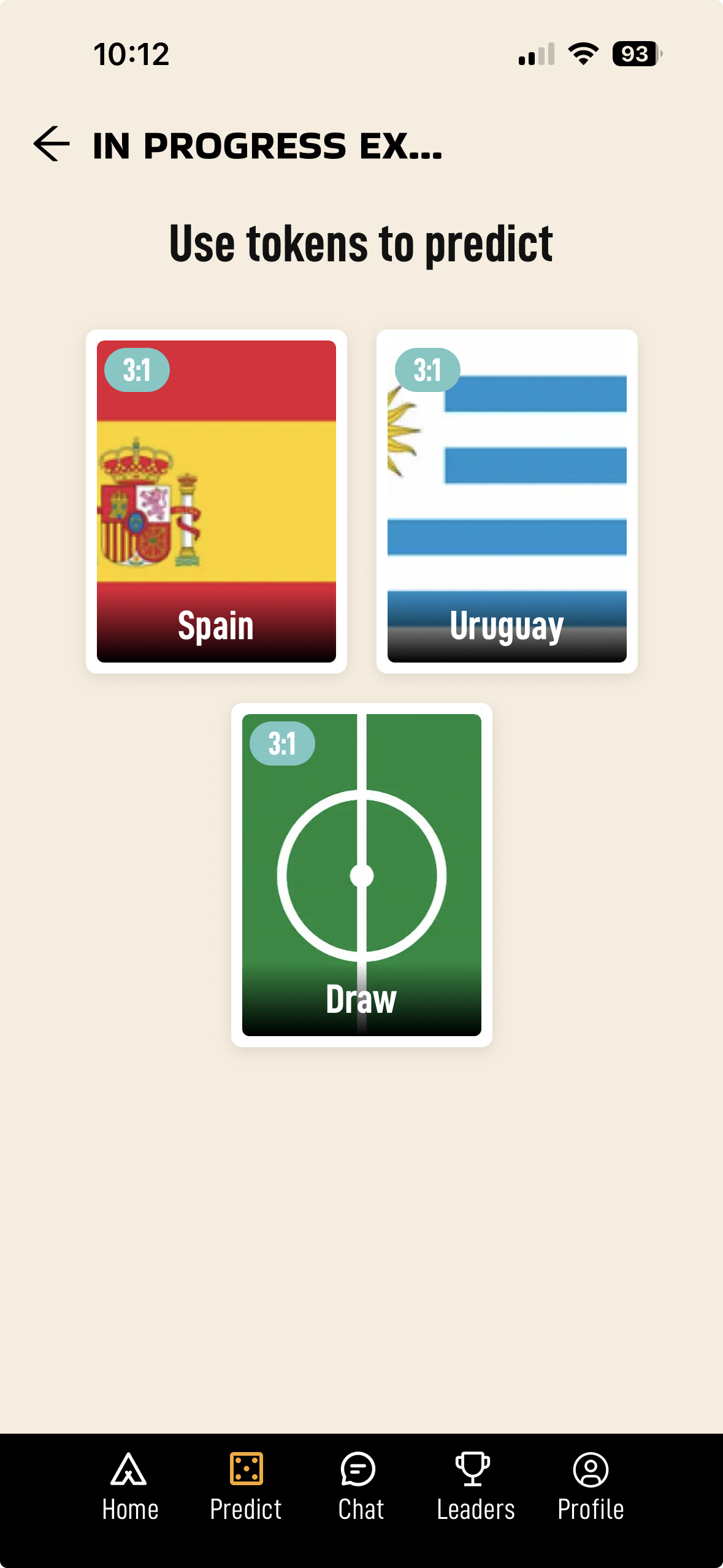 Use Tokens to Predict screen with three options: Spain, Uruguay, and Draw, each showing 3:1 odds.